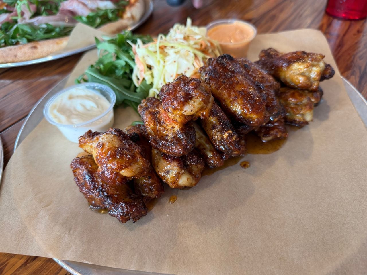 Chicken wings with coleslaw and dips