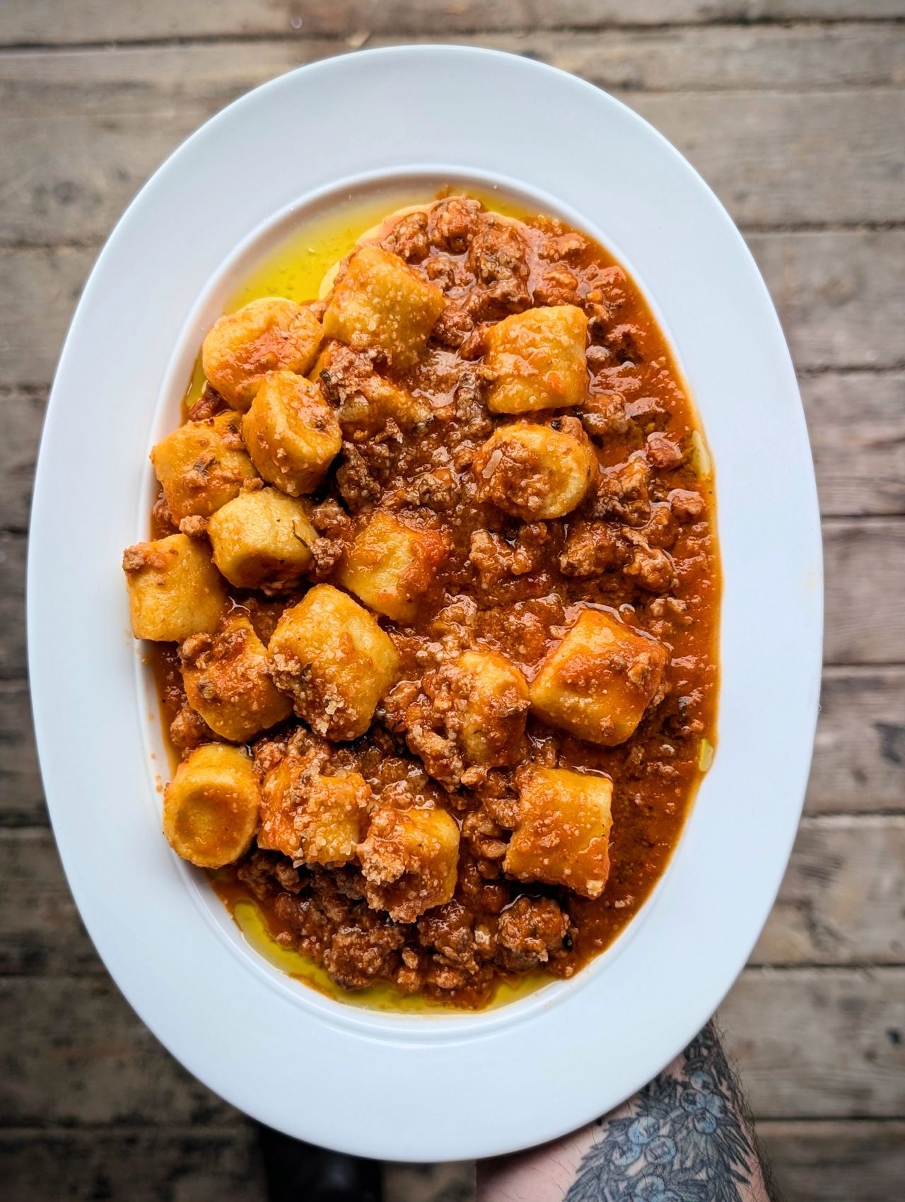 A plate of gnocchi Bolognese