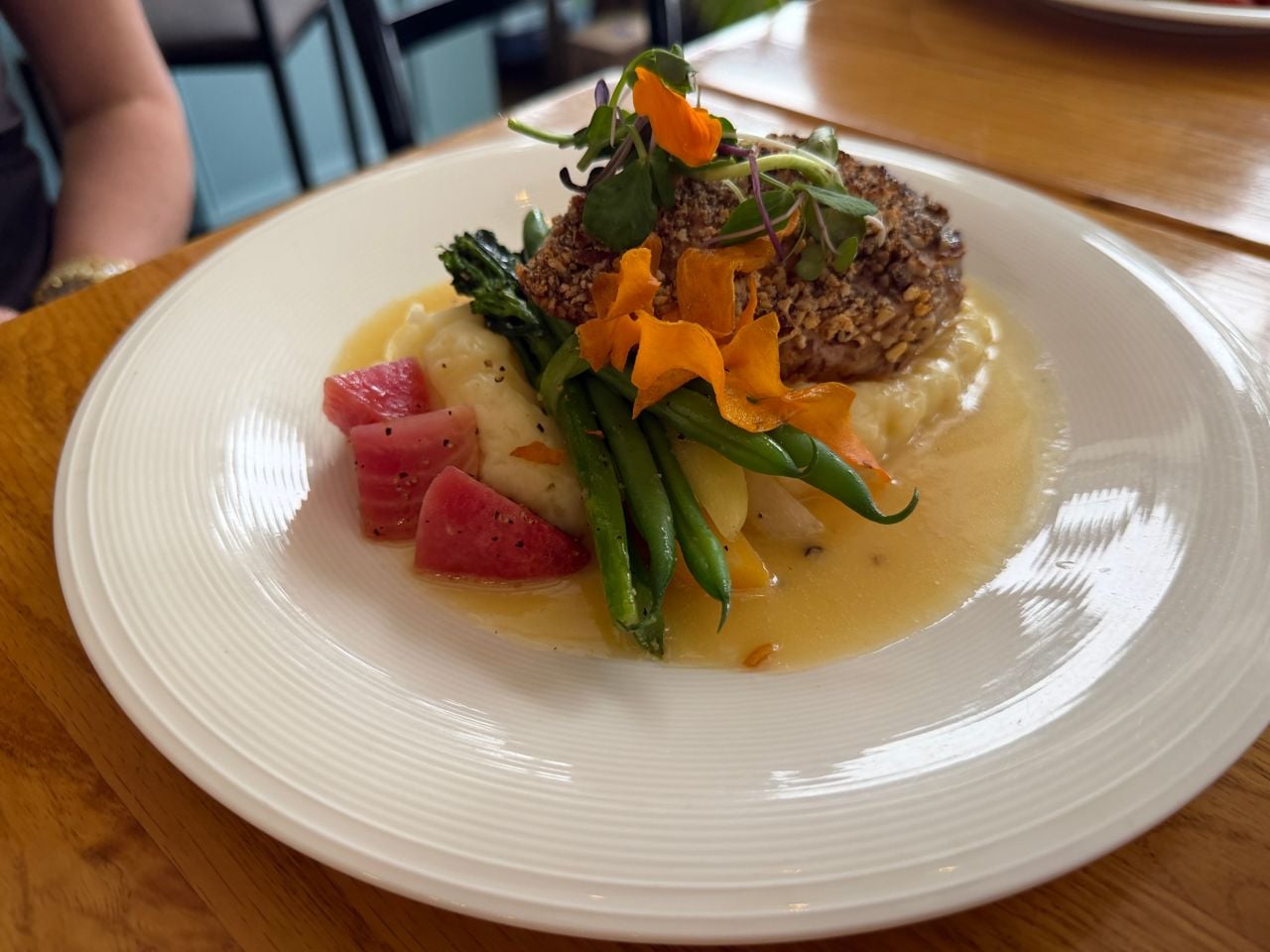 Pecan-crusted chicken with mashed potatoes and green beans