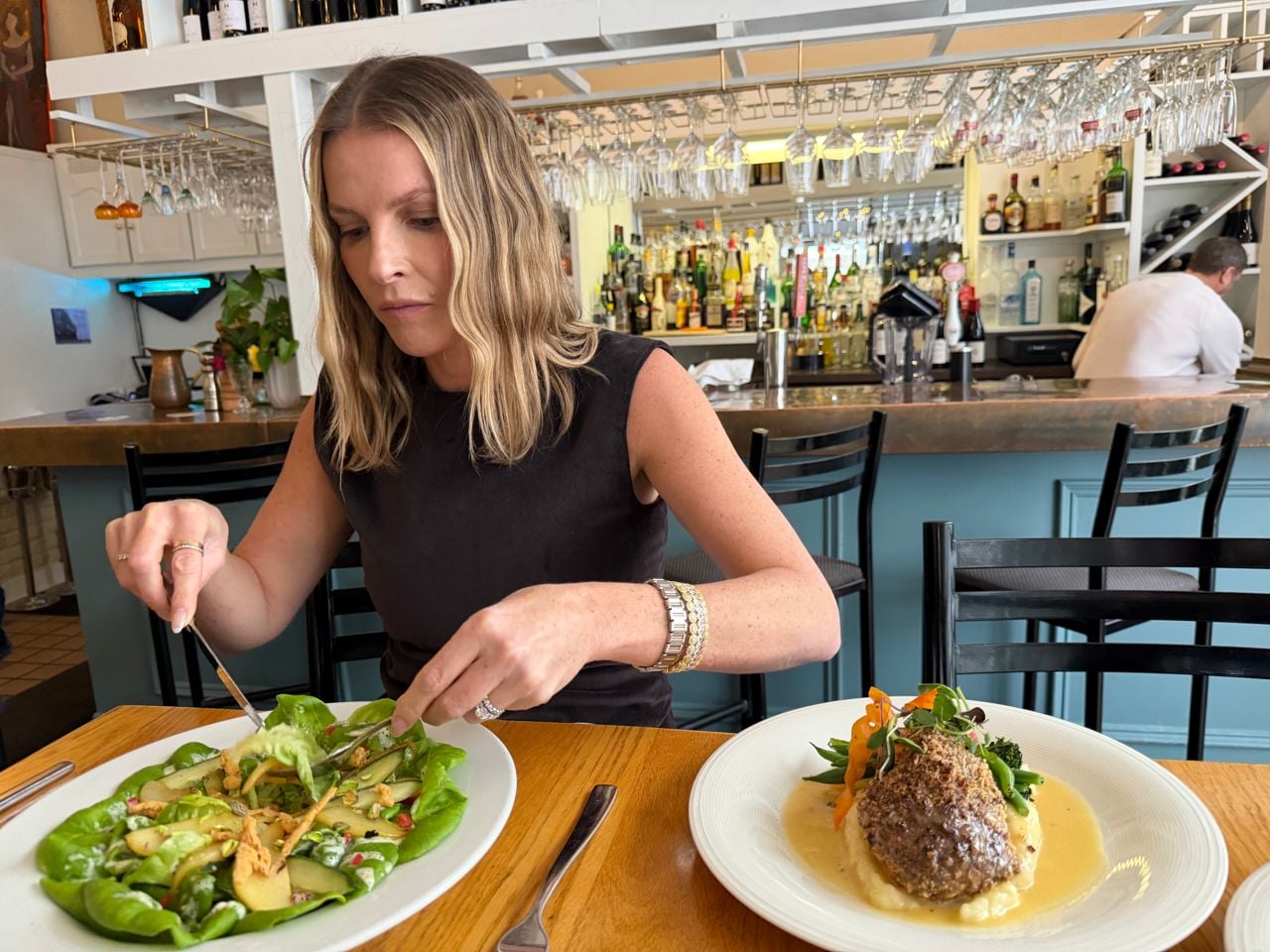 Katherine Feltis eats a salad at the Crazy Fox Bistro in Barrie