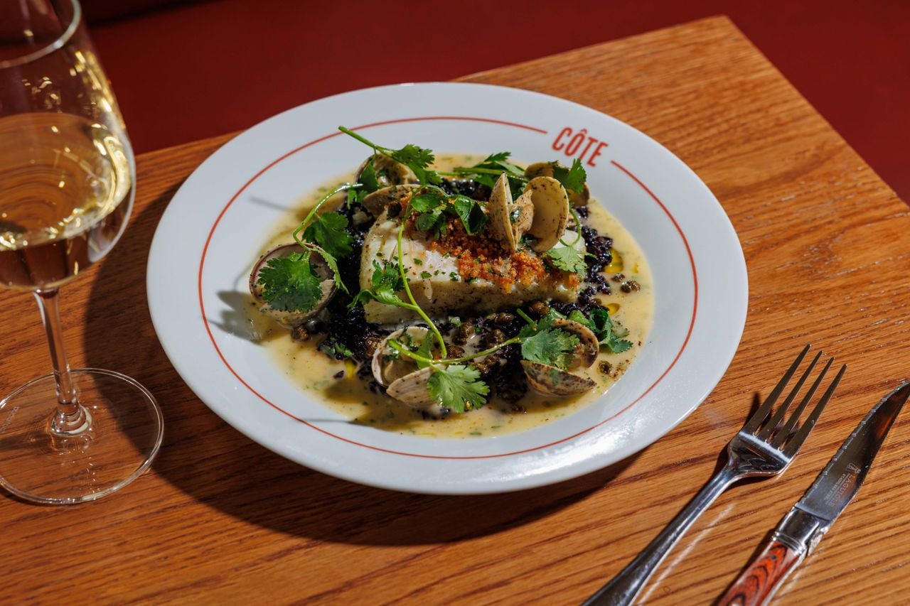 Steamed black rice, rich beurre blanc and oven-roasted Nova Scotia halibut, basted with tarragon butter