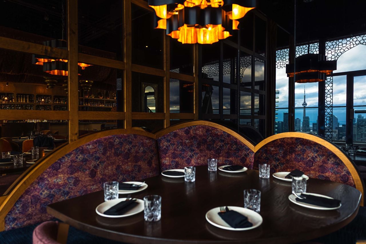 A table for seven in the Mar'aa dining room, with views of Toronto's skyline