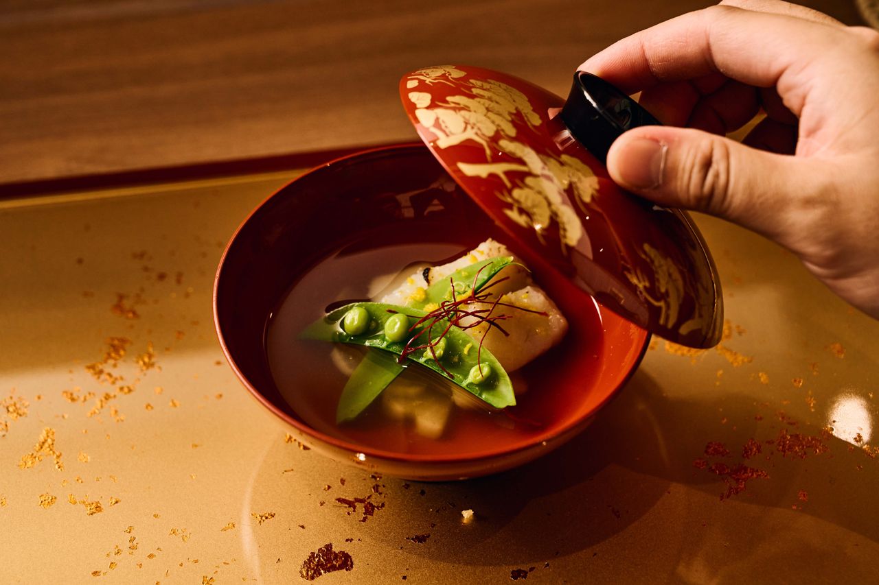 A clear cod broth with yuzu