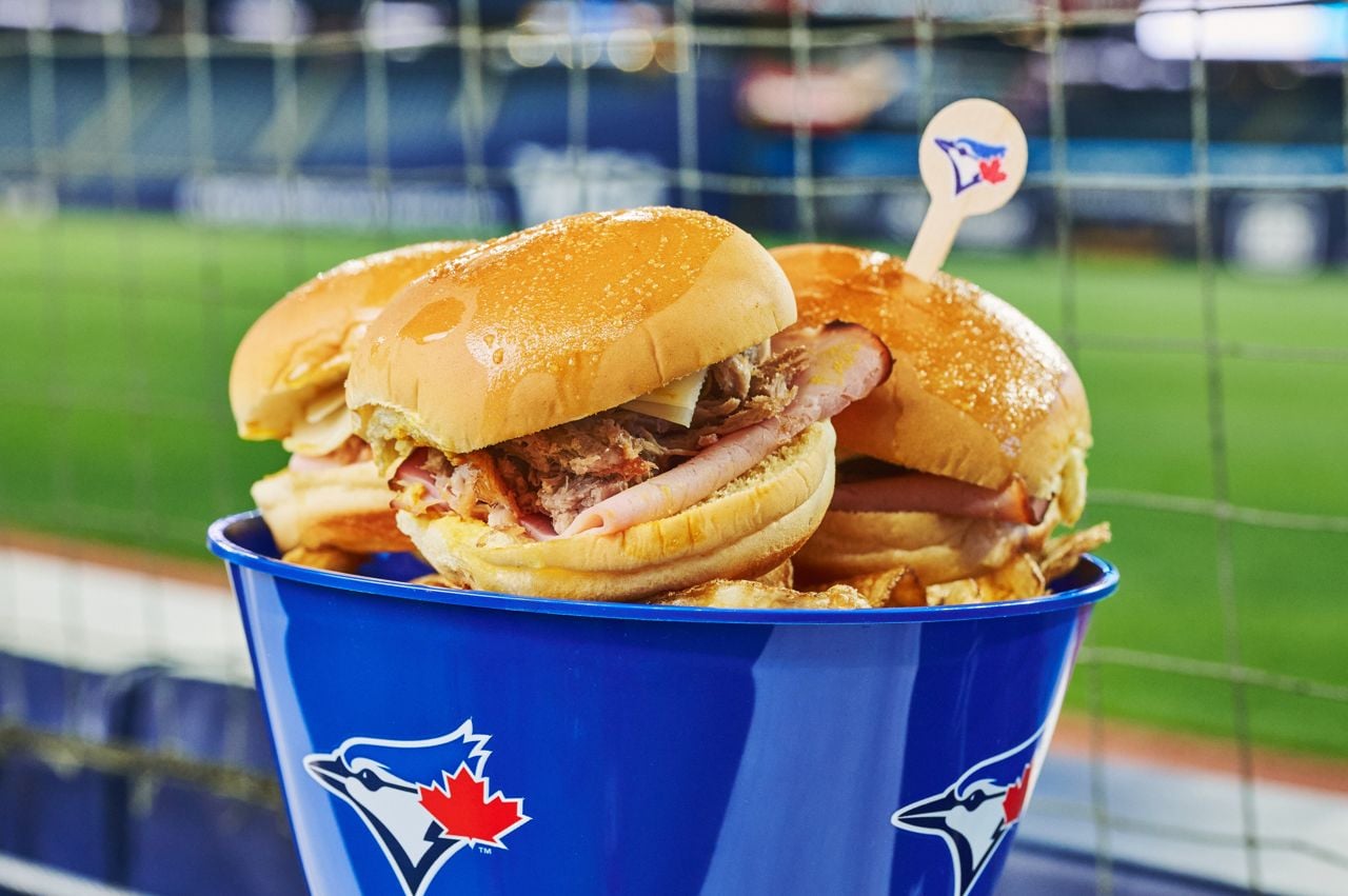 A bucket of three Cubano sliders and potato chips