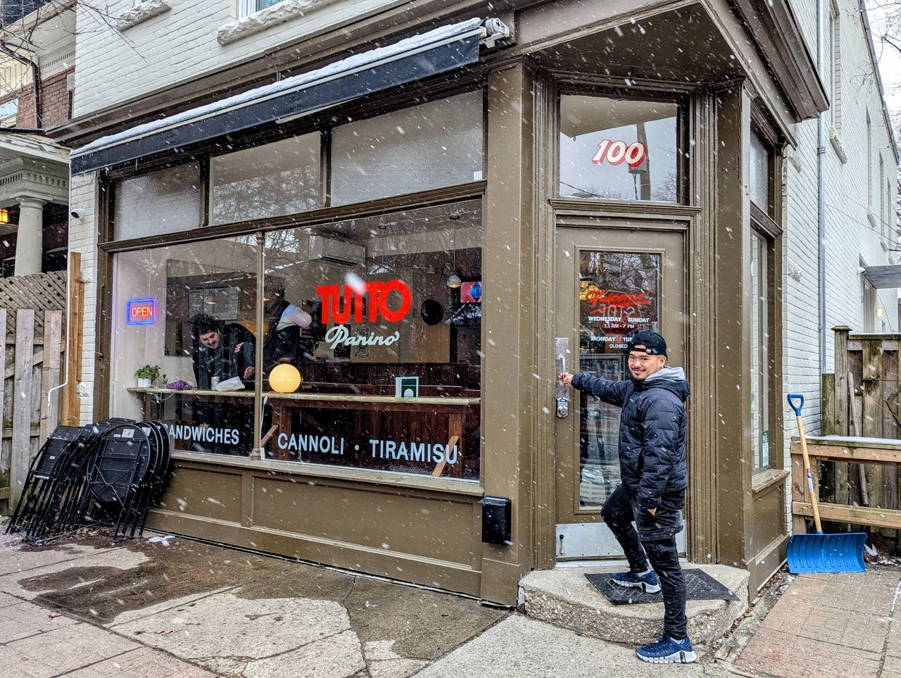 Chef Julian Cawagas stands at the entrance to Tutto Panino
