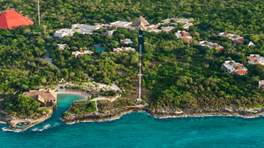 Wade through winding jungles and a tranquil cove at Occidental at Xcaret Destination