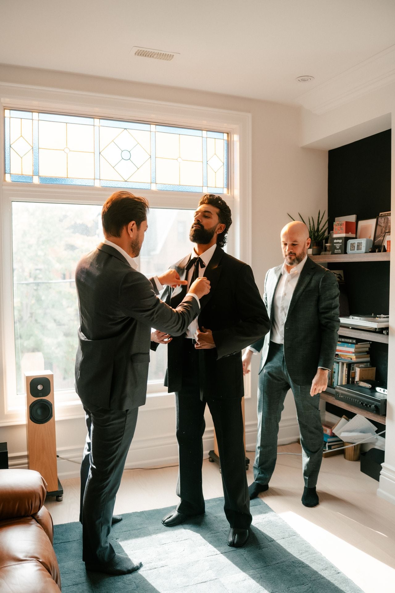 Groom getting ready with friends