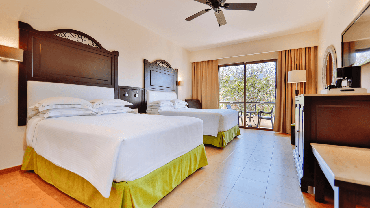 Wade through winding jungles and a tranquil cove at Occidental at Xcaret Destination