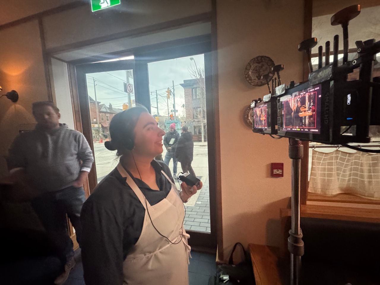 Chef Shauna Godfrey watches as a TV show is filmed inside her restaurant