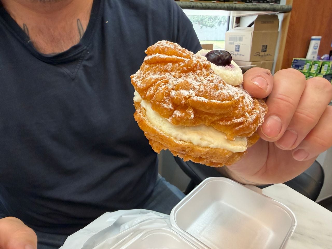 A closeup of a ricotta zeppole