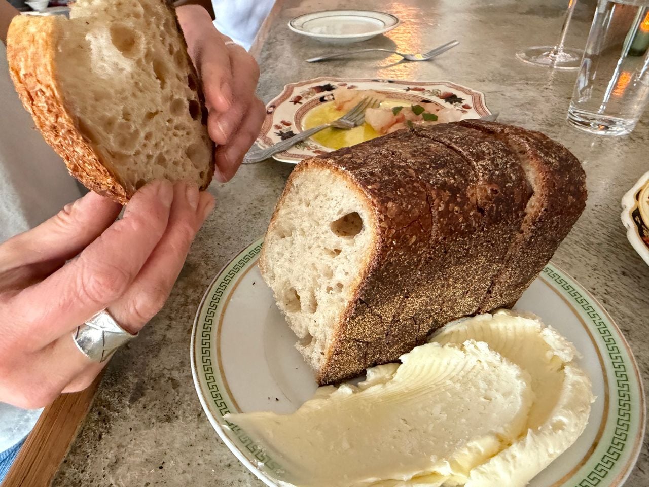 Slices of sourdough bread and salted butter