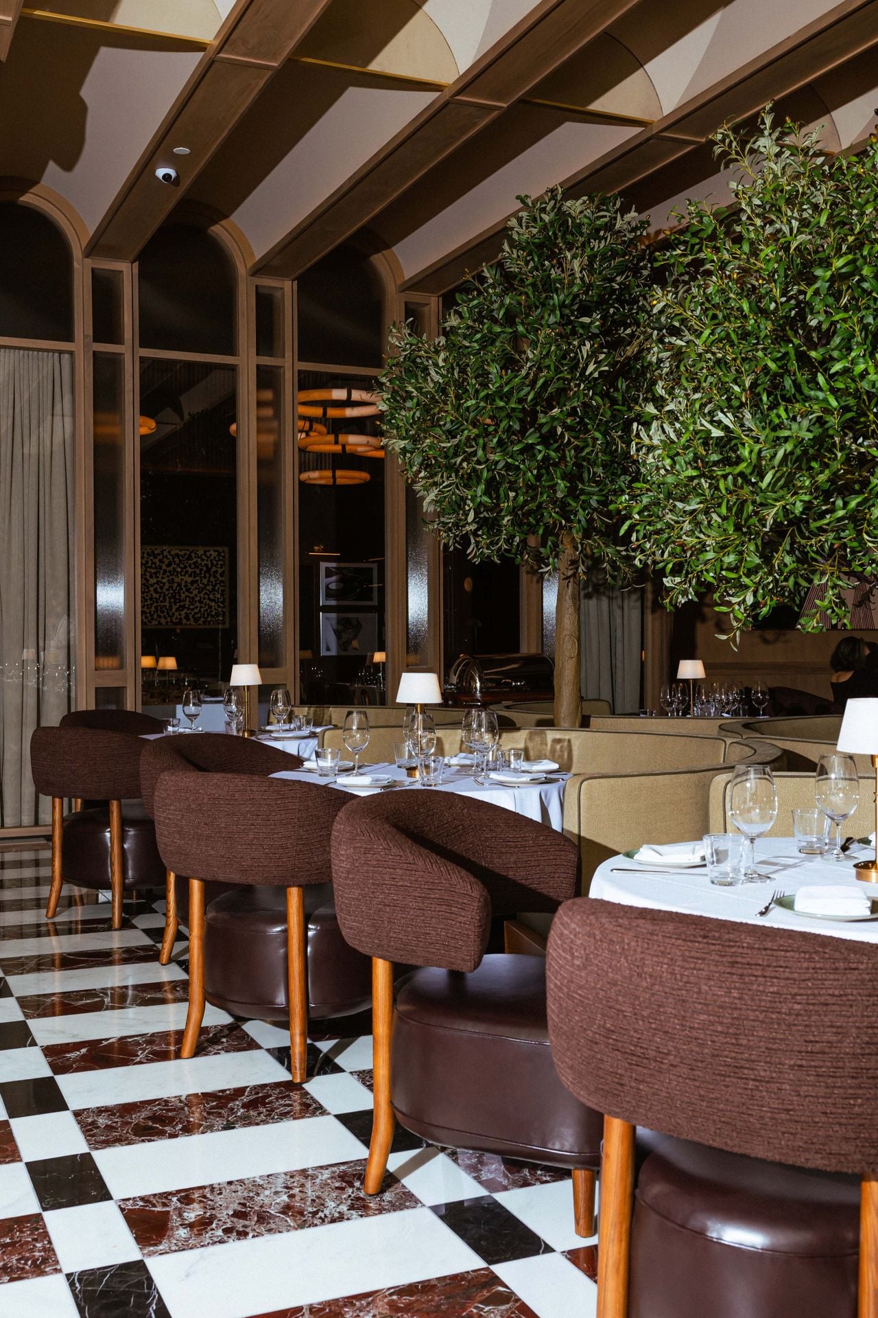 Marble flooring and floor-to-ceiling windows in the dining room of Riley's Fish and Steak