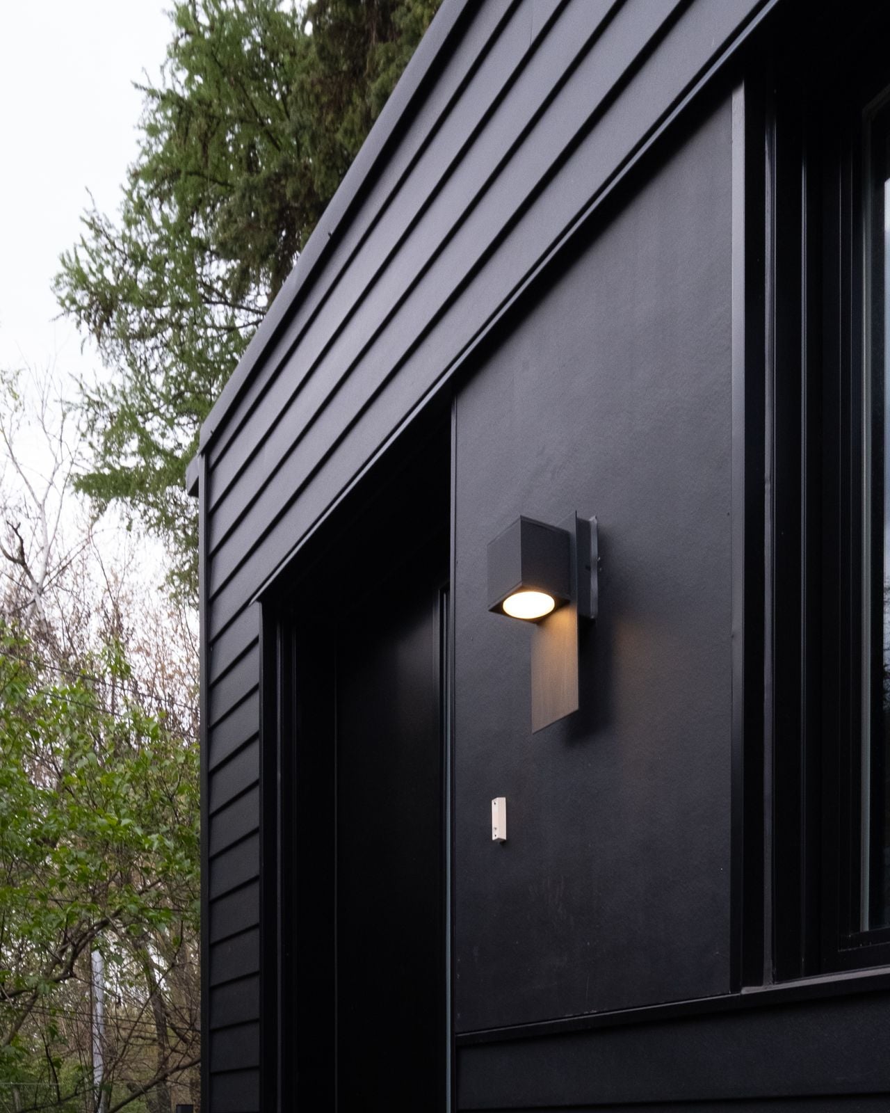 Inside a sloped two-storey Danforth garden suite with cathedral ceilings