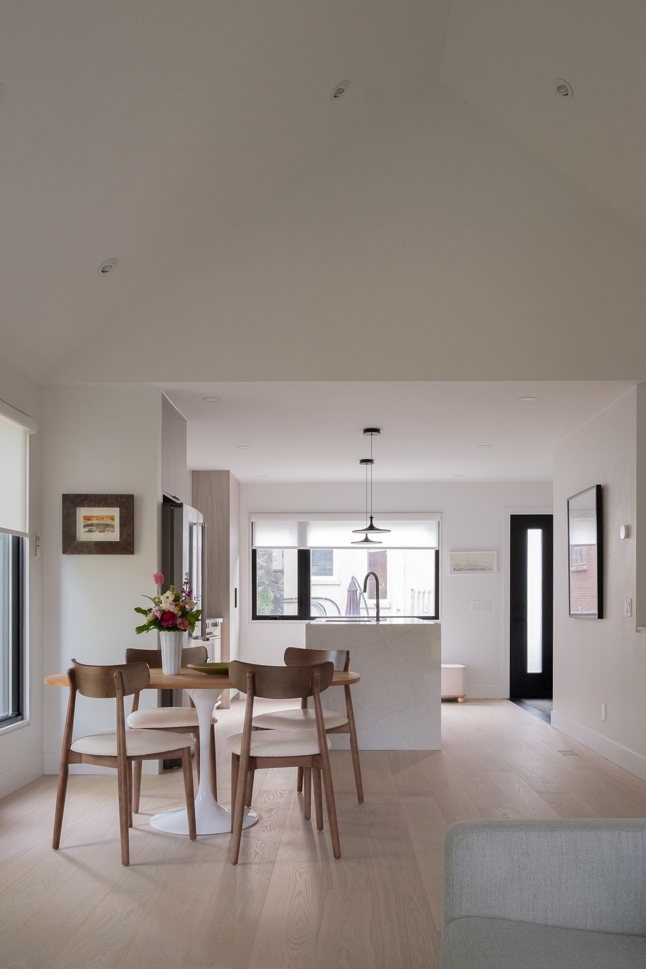 Inside a sloped two-storey Danforth garden suite with cathedral ceilings