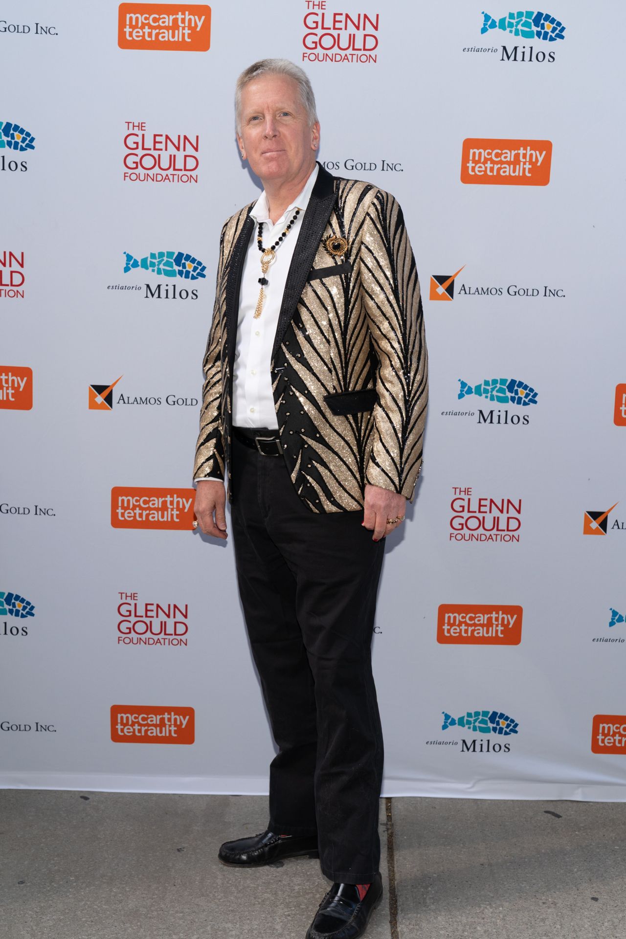 Man wearing a sparkly tiger print jacket