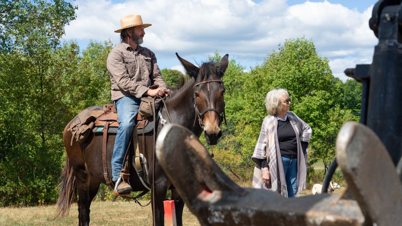 Tom Green riding a mule