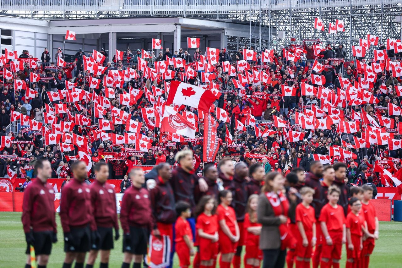 The crowd cheering for Team Canada ahead of a FIFA soccer game
