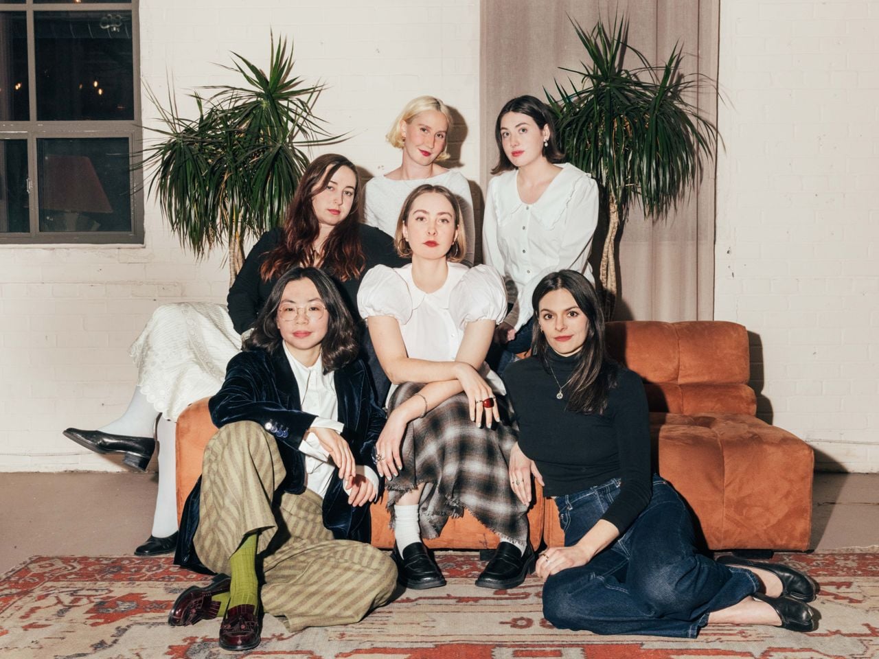 Six women sitting together