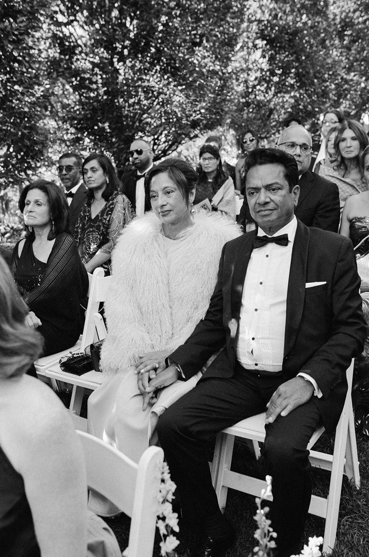 Groom's parents watching ceremony