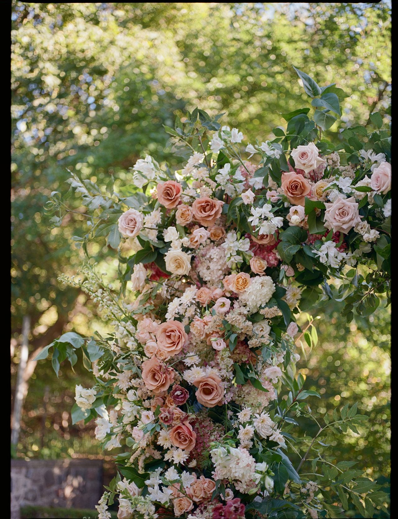 Inside a black-tie queer wedding that doubled as an ornate garden party