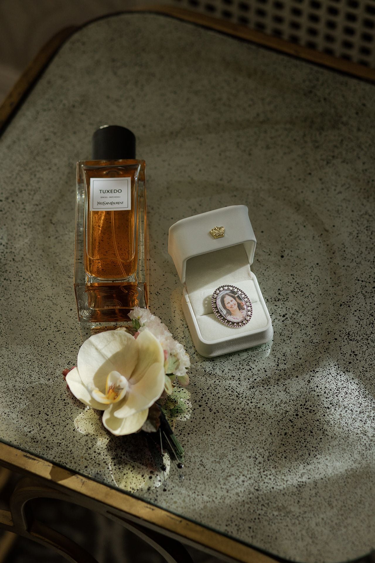 Memorial brooch with groom's mom on it