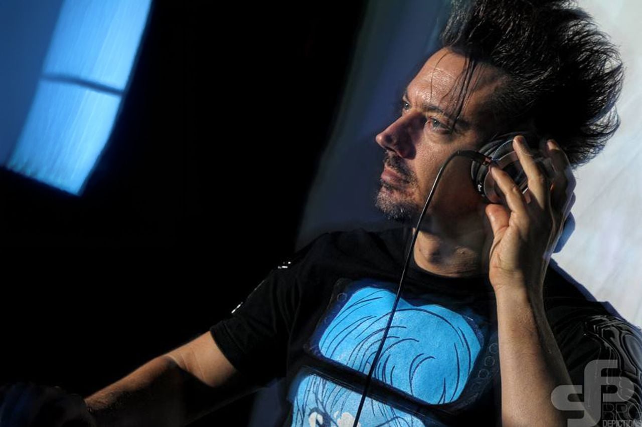White guy DJing