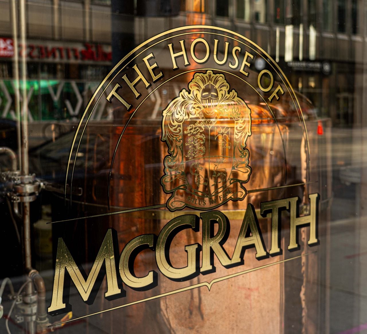 A sign on the window of the House of McGrath