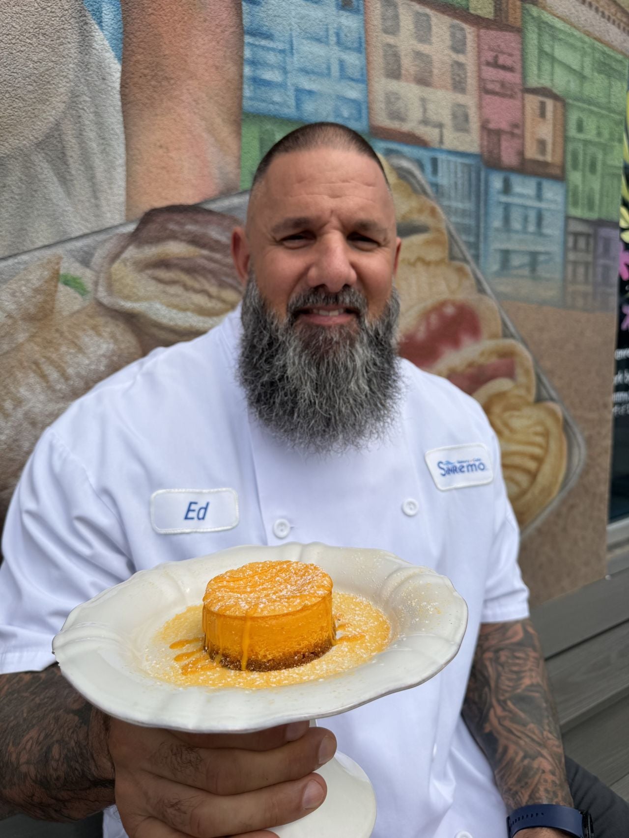 Sanremo owner Ed Bozzo and the KD cheesecake