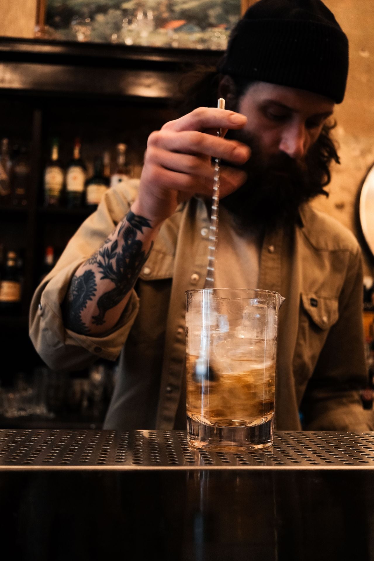 Bartender Joel Savoie makes a cocktail