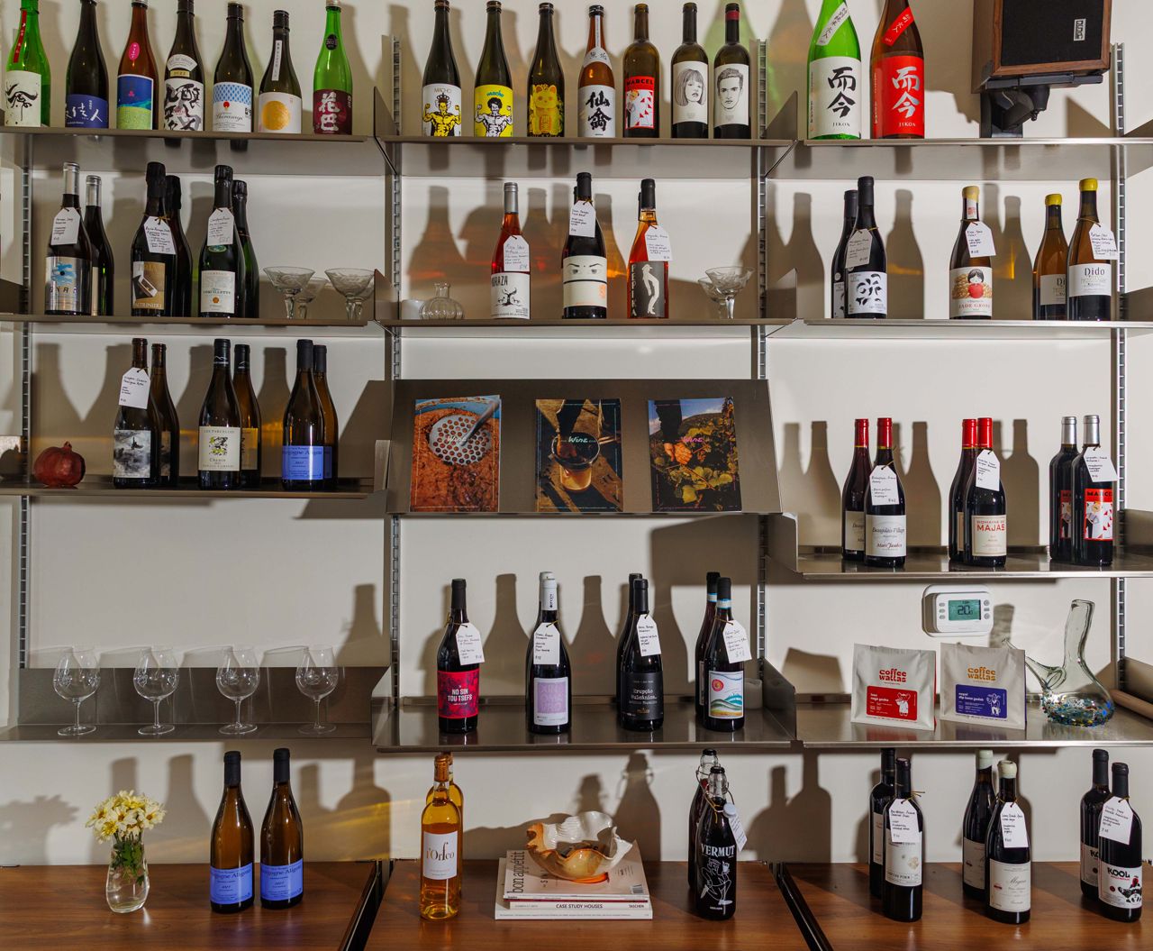 Shelves lined with bottles of wine and sake