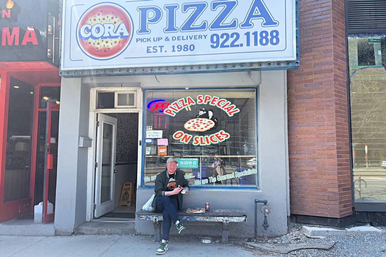 Chef Adam Ryan sits outside of Cora Pizza