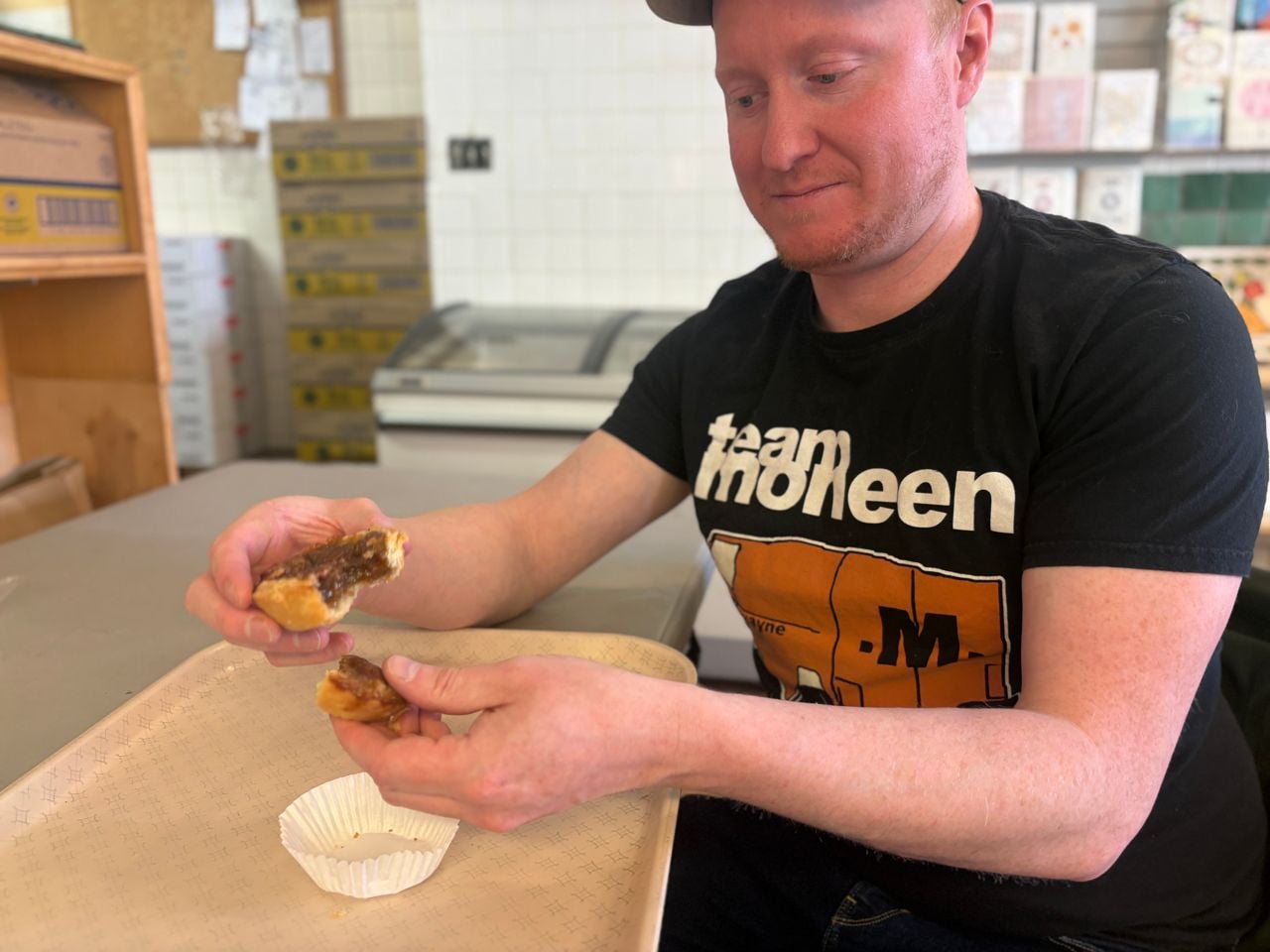 Chef Adam Ryan holds a butter tart
