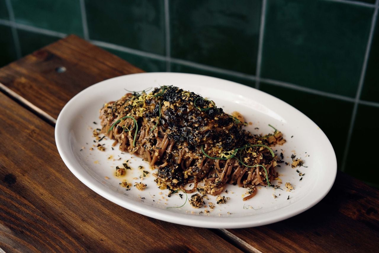 Korean-imported acorn noodles coated in a silky and savoury pesto
