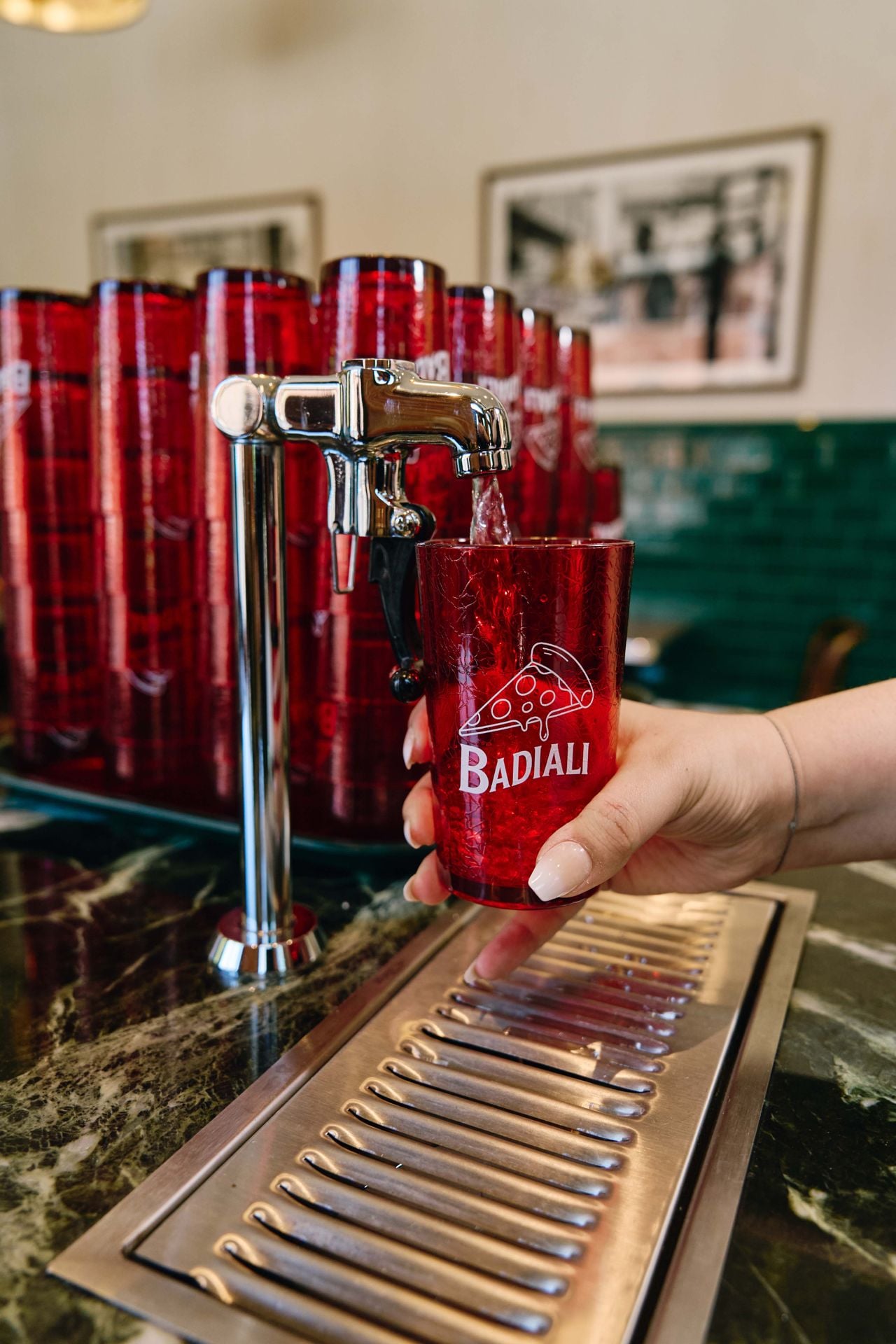 A self-serve water station at Pizzeria Badiali