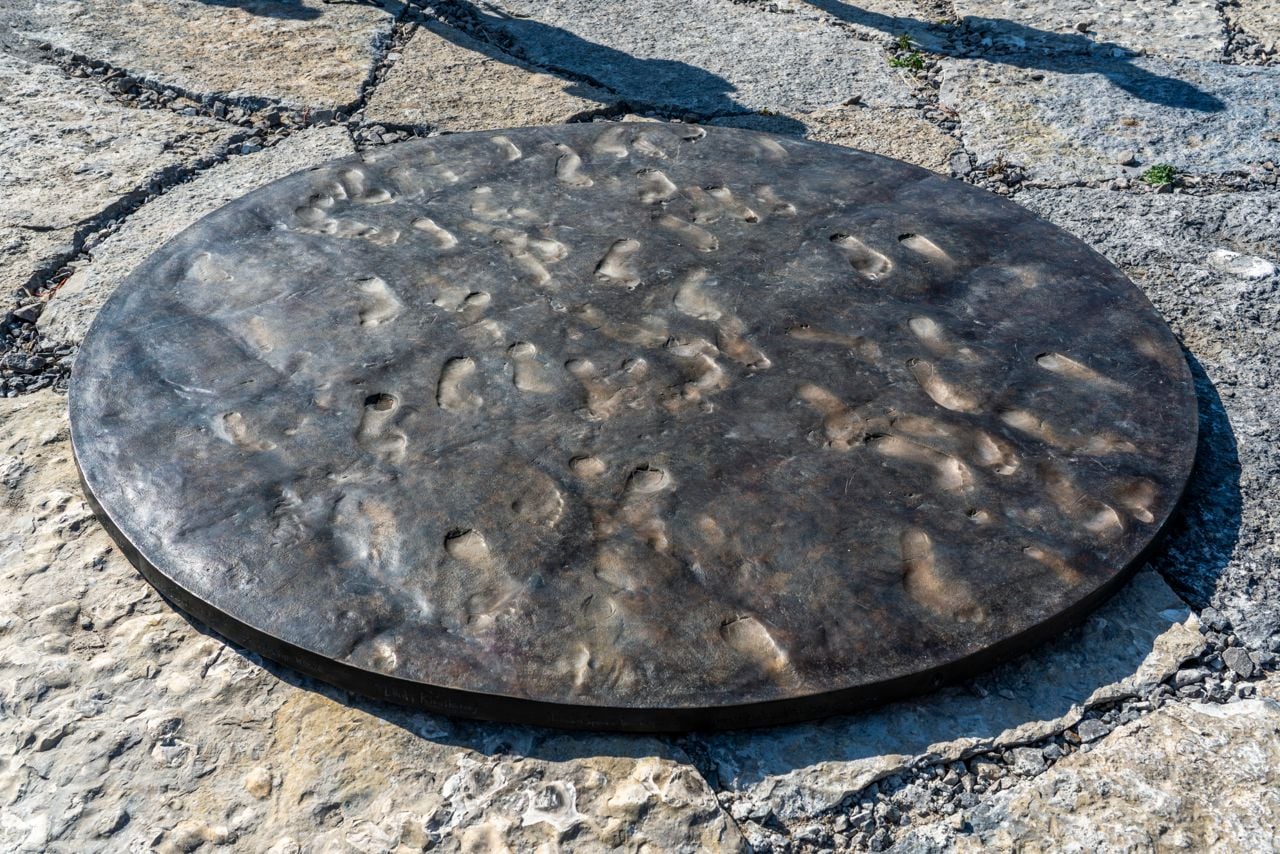 Circle of footprints cast in bronze