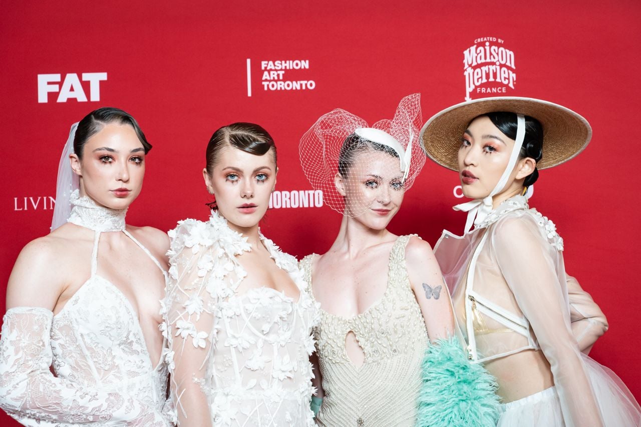 Four models standing together
