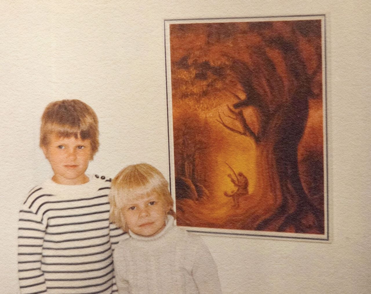 Artist Sami Suomalainen's nephews, Antti and Jaakko, in front of one of his paintings