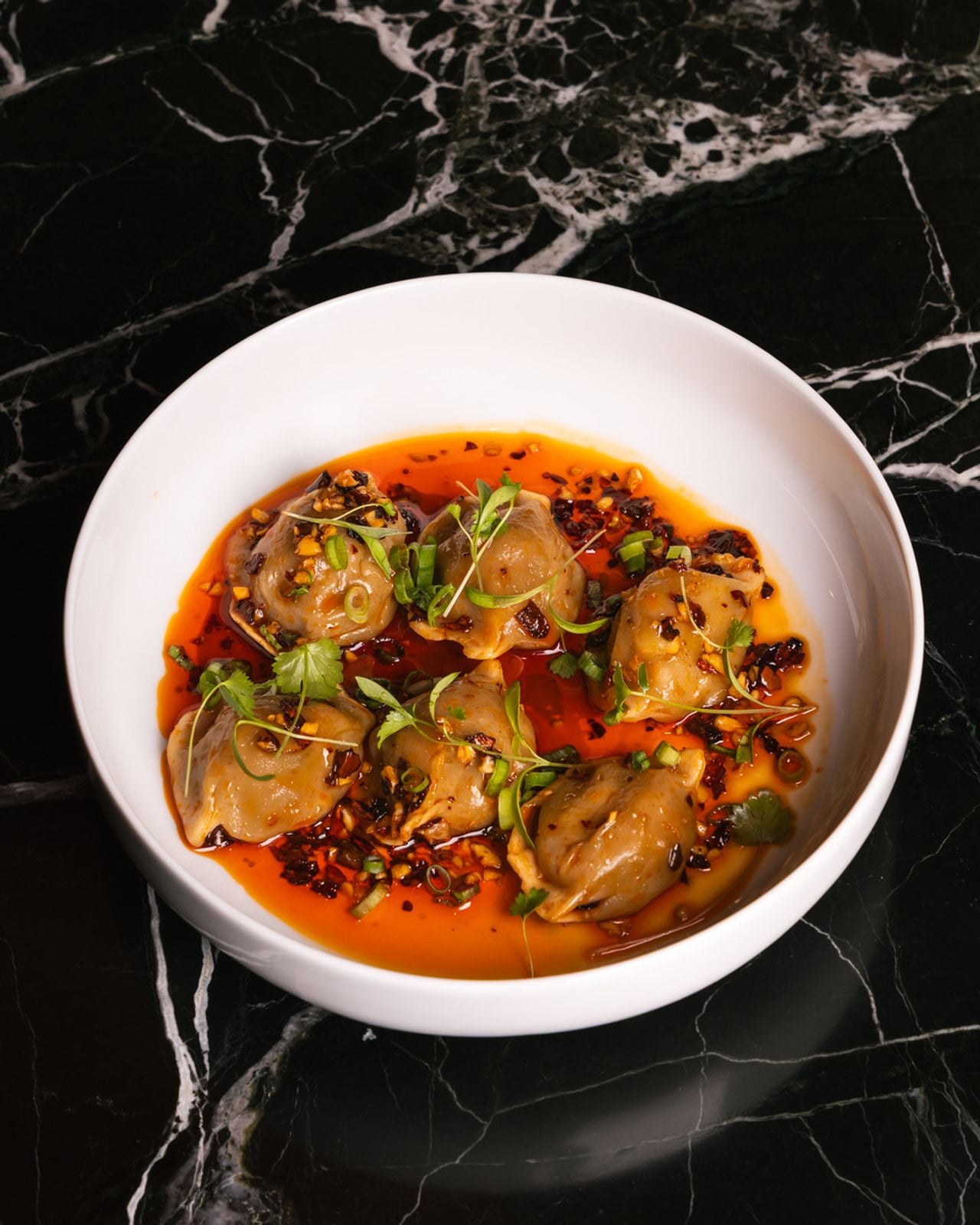 A bowl of dumplings from Honey Chinese