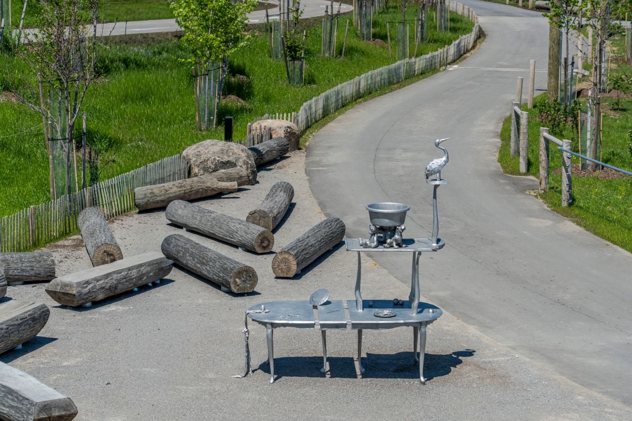 Metal table with household objects on top