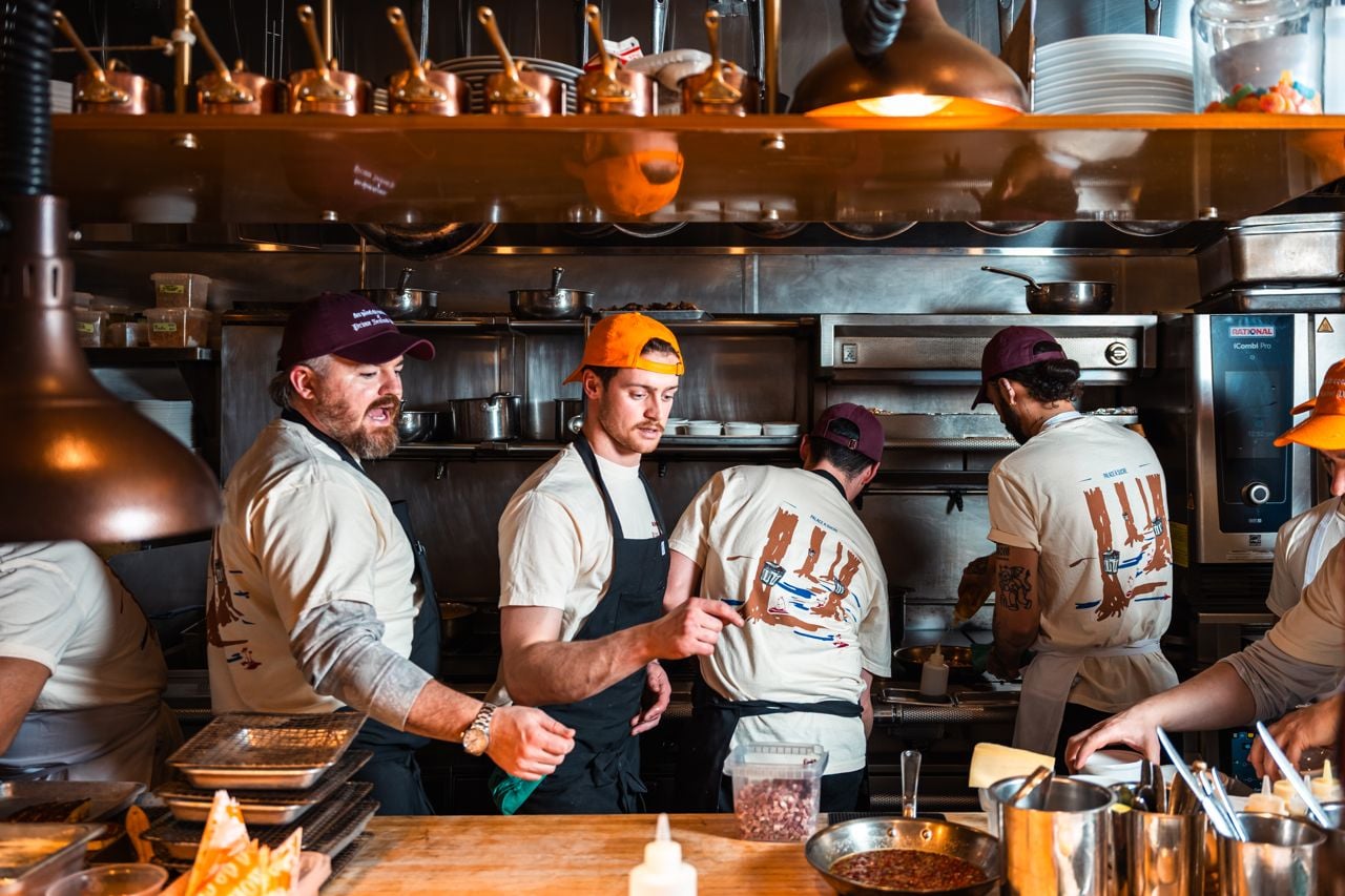 Chef Coulson Armstrong works in a kitchen with the team from Au Pied de Cocho