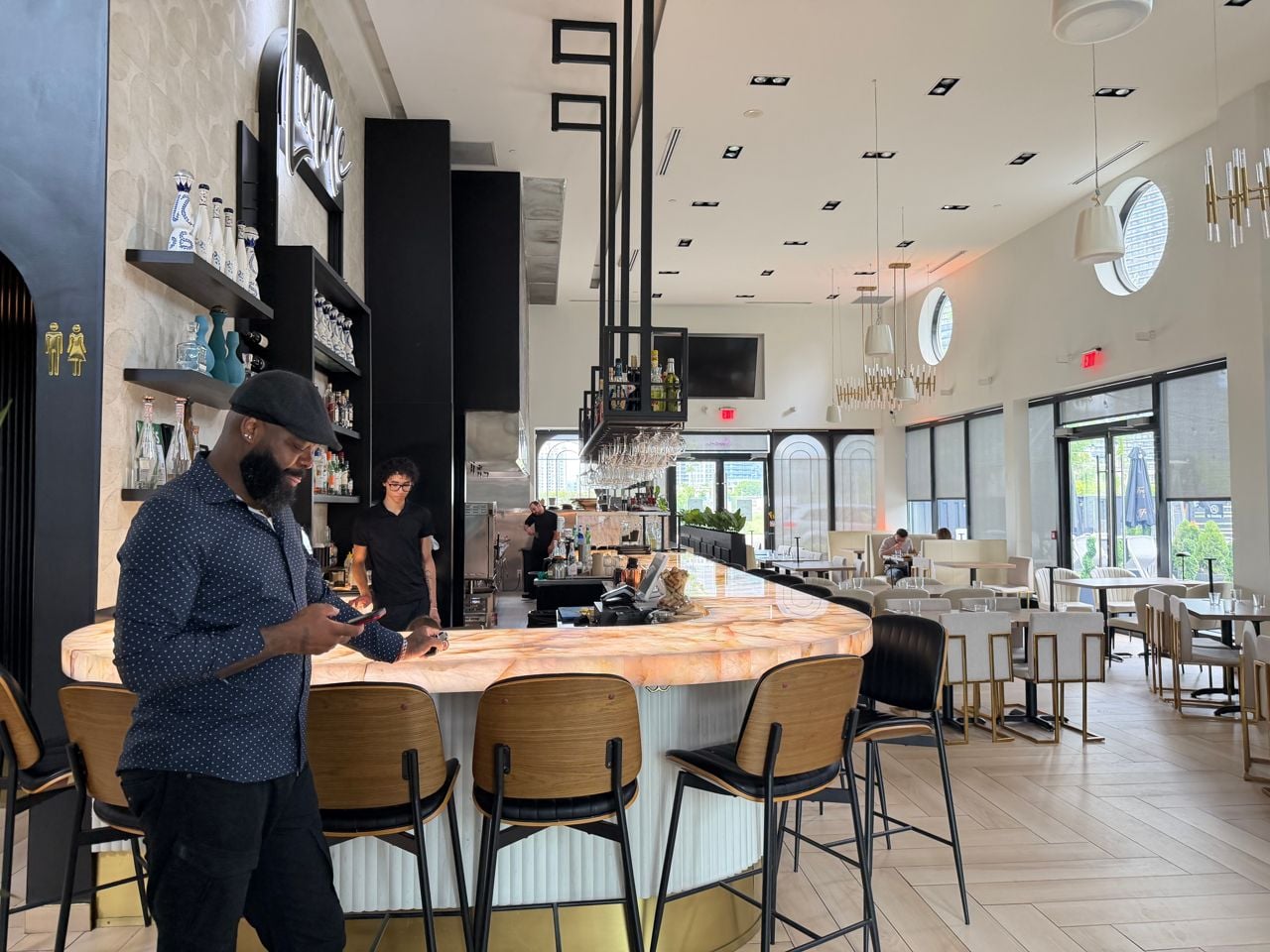 James Obazee inside the dining room of Lume Kitchen