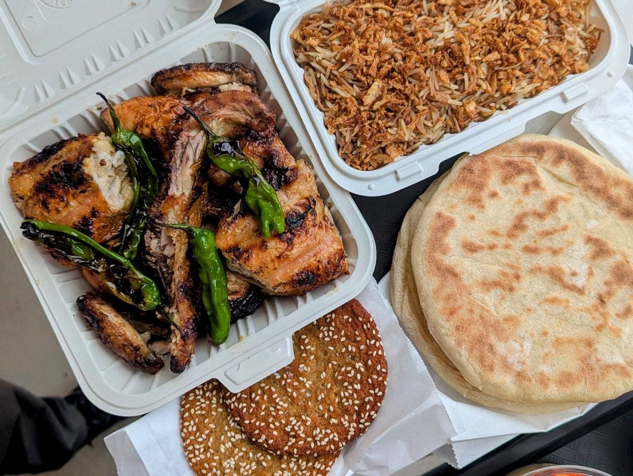 Charcoal-grilled chicken with rice, pita and cookies from Mozy's Charcoal