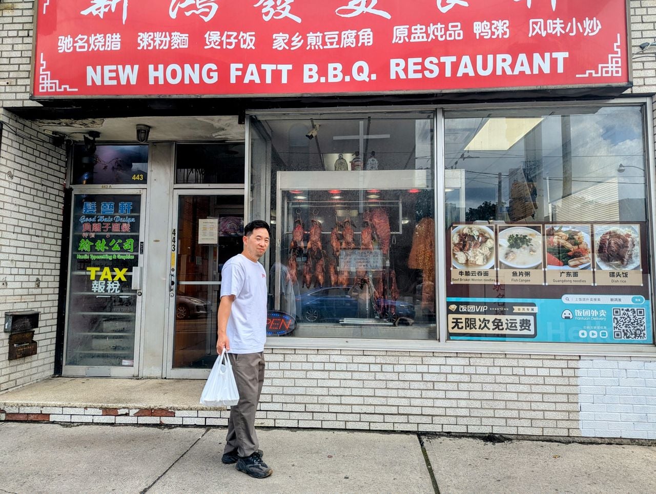 Chef Jeff Kang stands outside of New Hong Fatt BBQ Restaurant