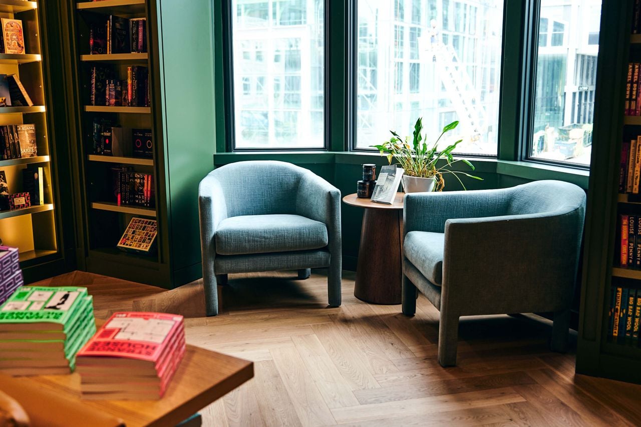 Two chairs in a bay window at a bookstore