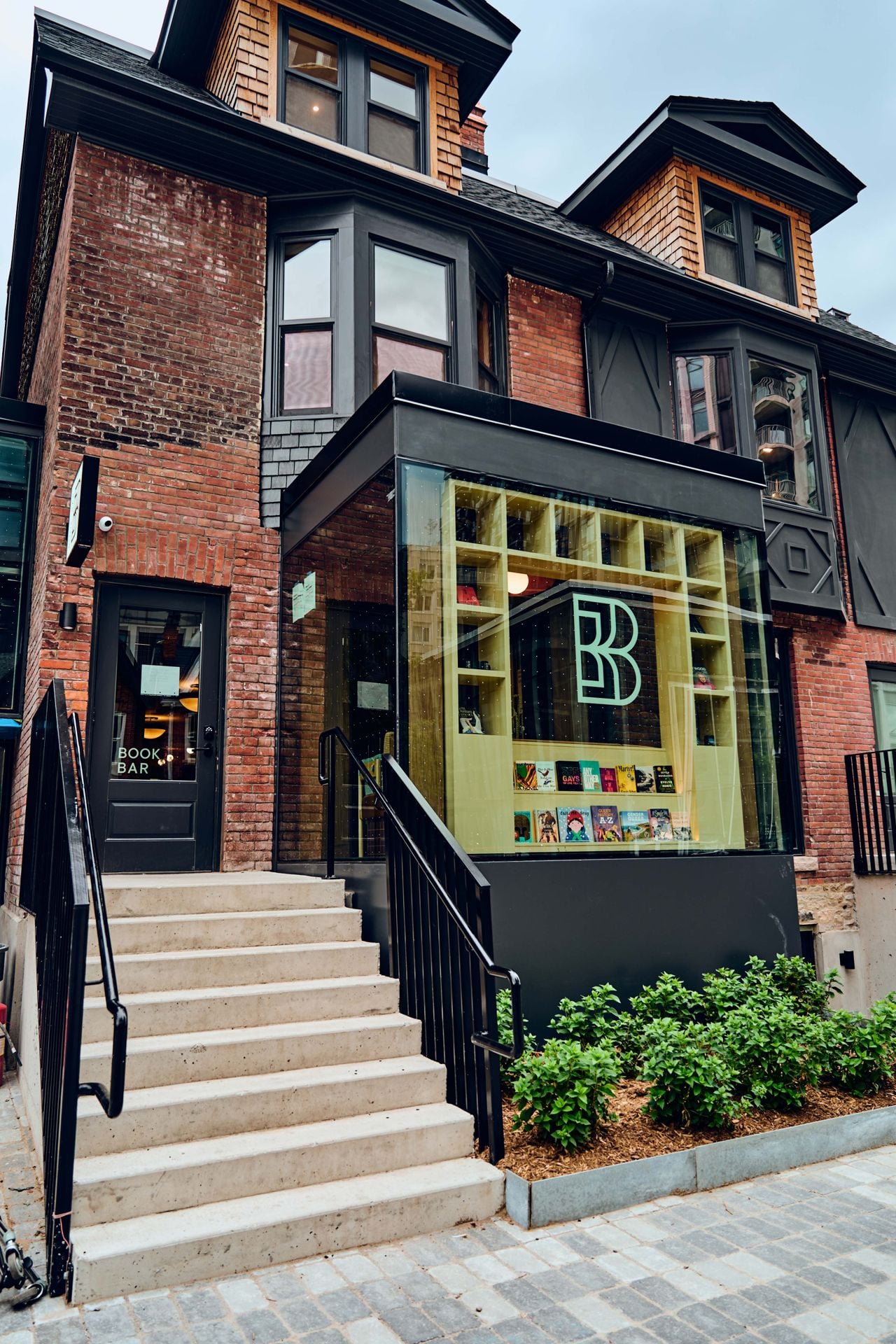 The exterior of Book Bar, a bookstore that's also a bar in Toronto