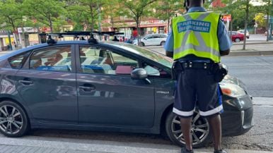 A Mercedes driver allegedly hit a parking enforcement officer with his car over a ticket