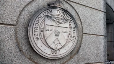 Toronto police are accused of conspiring to operate illegal cannabis dispensaries and massage parlours