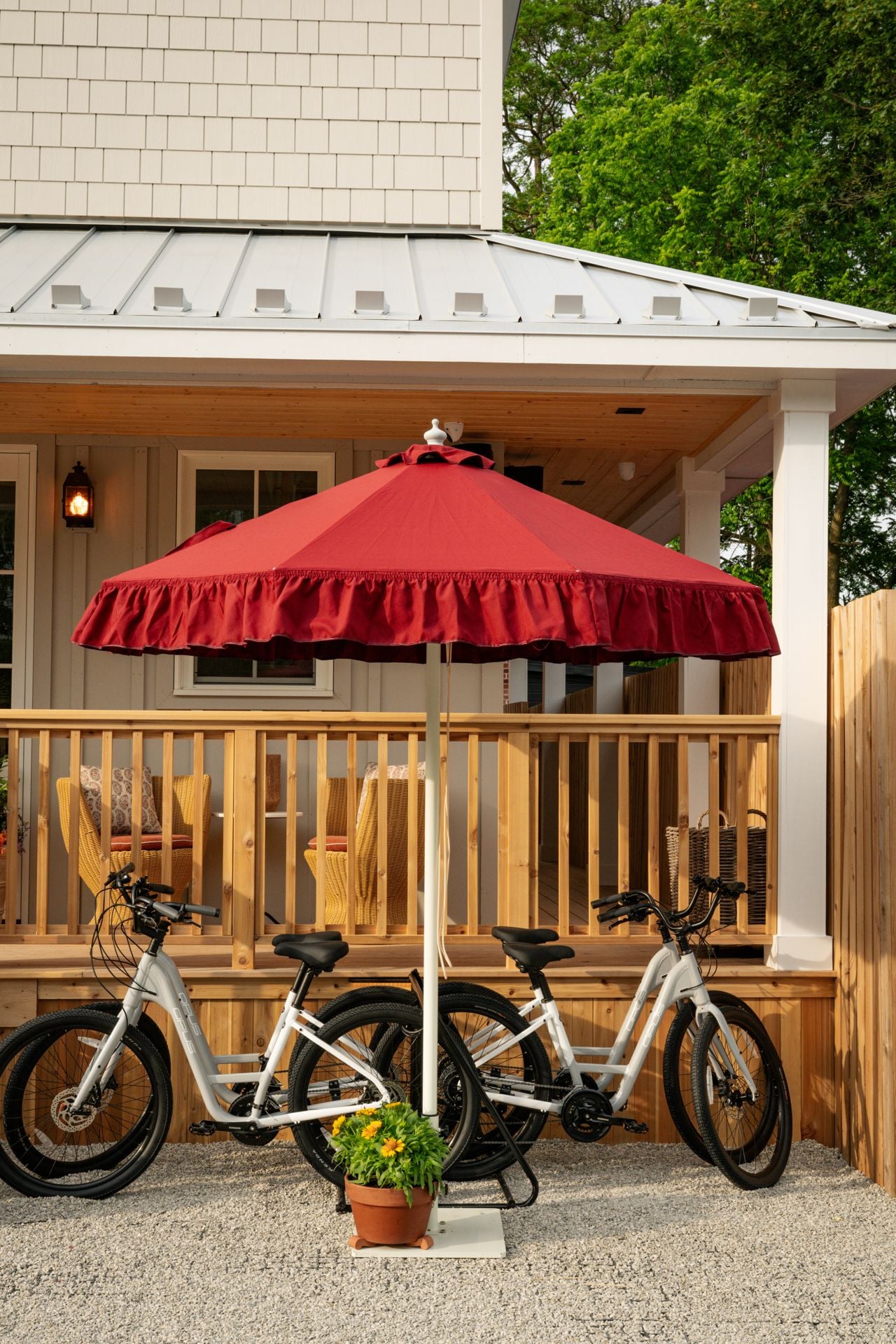 Bicycles under a red umbrella