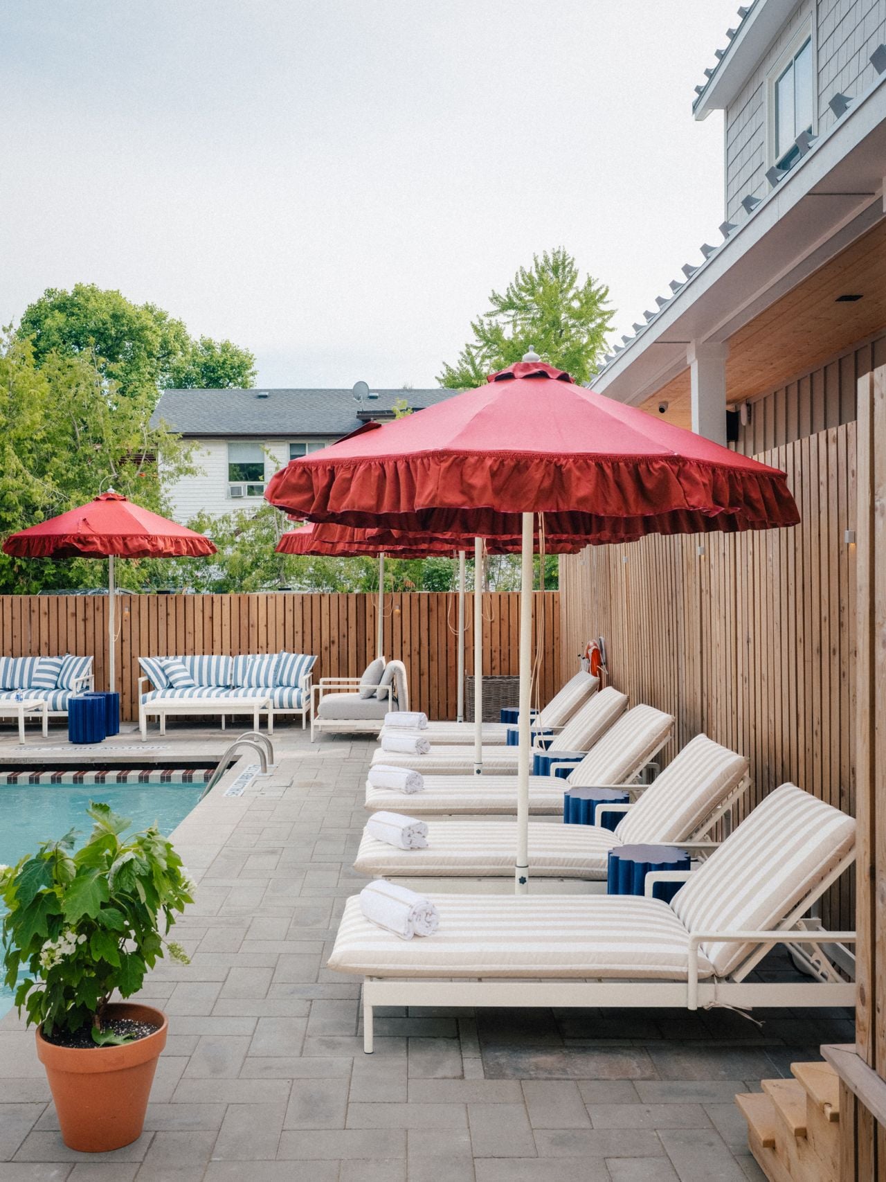 Lounge chairs by a pool