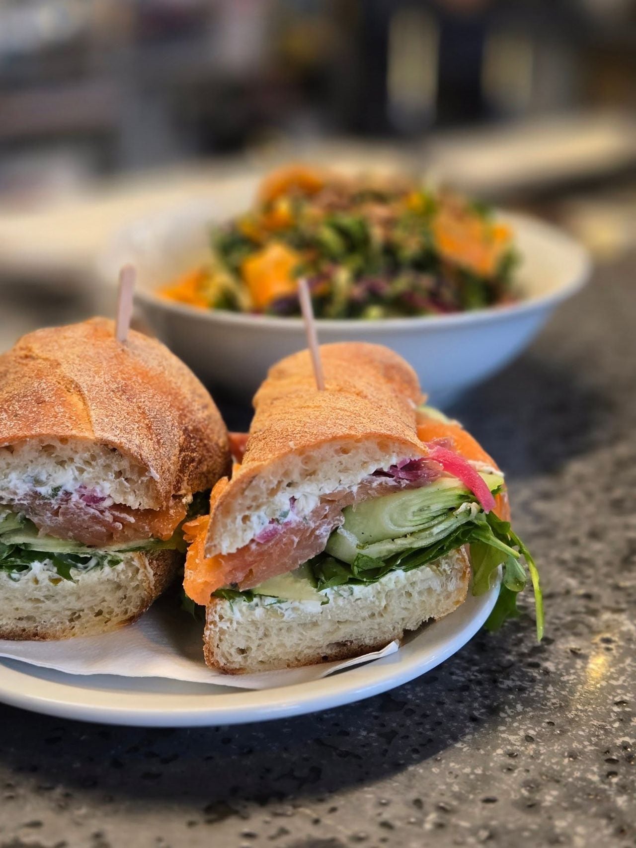 A smoked salmon sandwich on a baguette